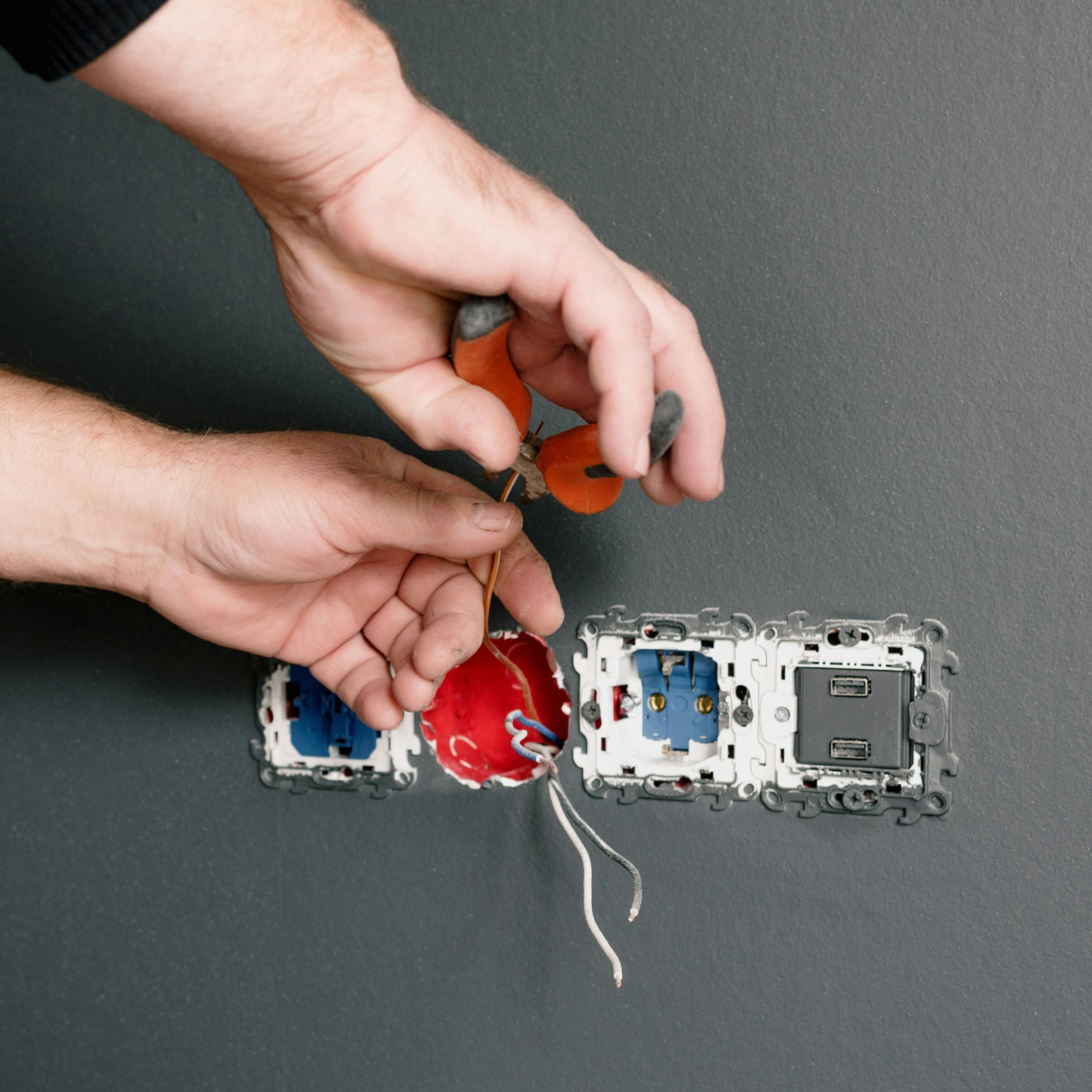 Person doing electrical work